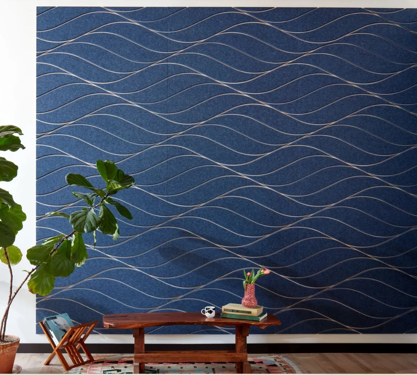 Sculptural three-dimensional PET acoustic wall panels in a lounge setting